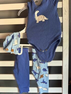 The Peanutshell blue Dino onesie with pants and a matching hat